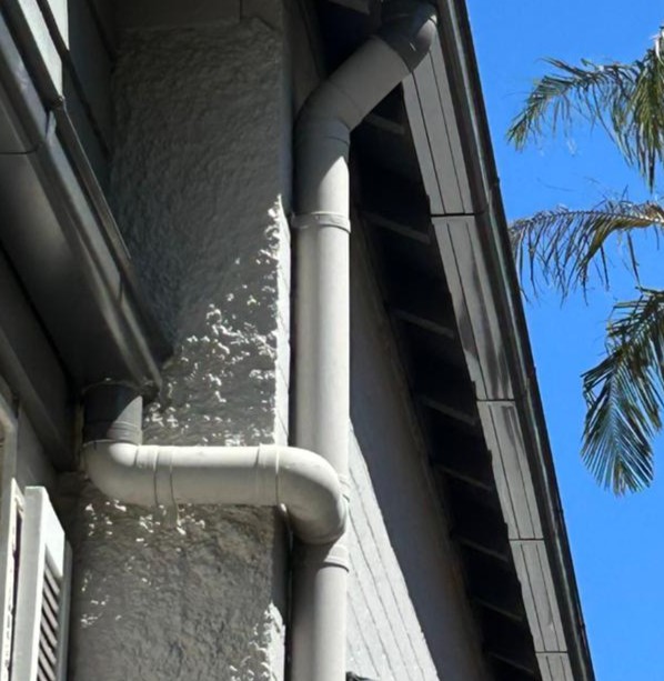Professional downpipe installation by North Shore Roof and Gutters