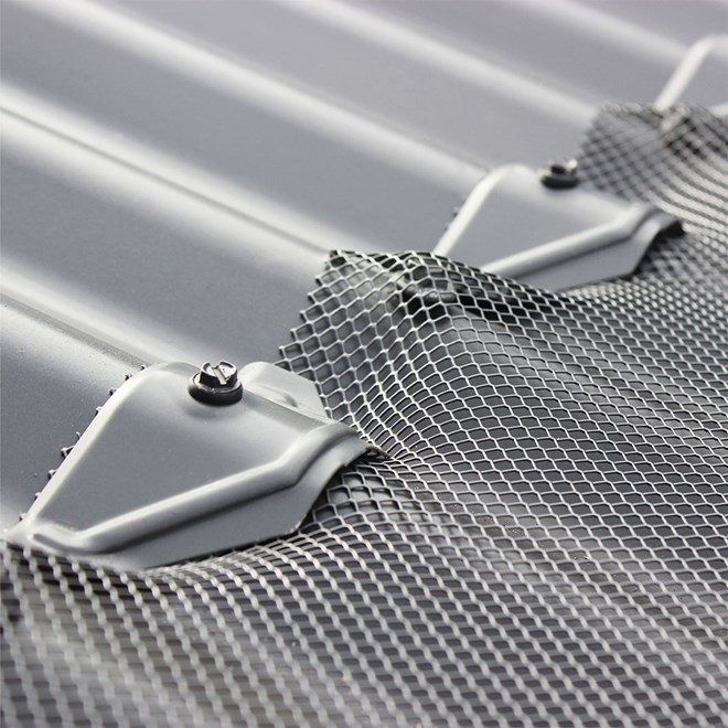 Gutter guard and solar bird proofing